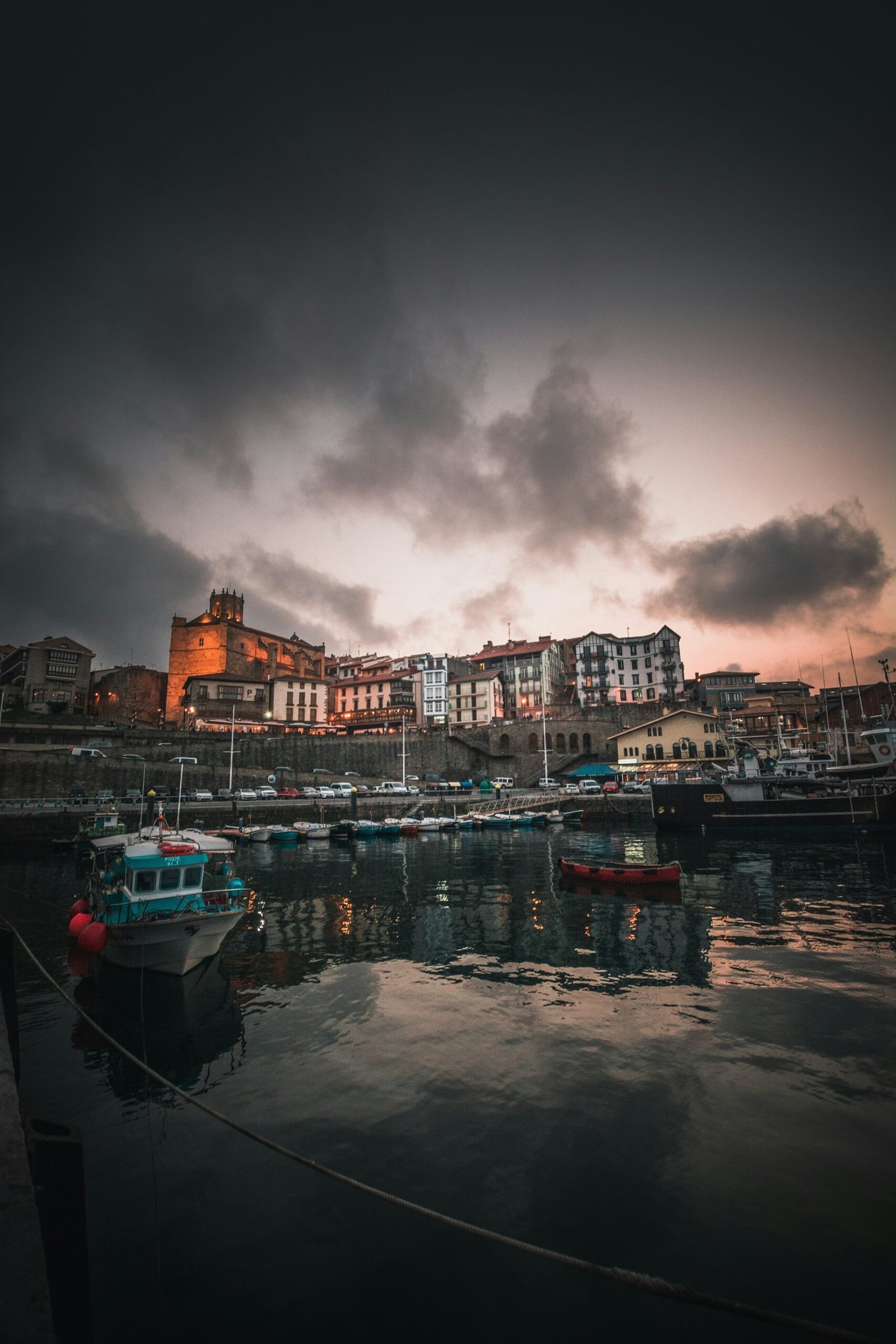 landscape photography of house and boat